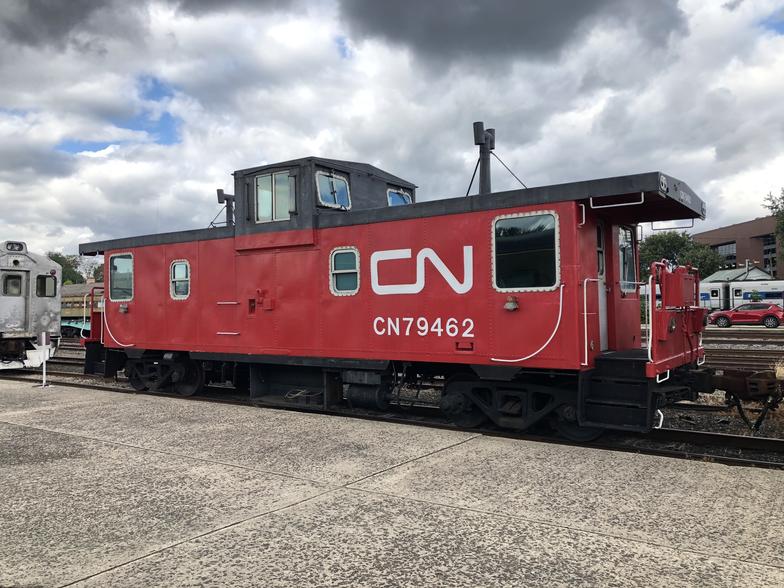 Before modern air brakes, stopping a train was a risky, hands-on job. Brakemen climbed atop train cars, turned large brake wheels by hand, and quickly moved from car to car to slow the whole train down. One brakeman worked from the engine backward, while the other started at the caboose and moved forward. It was dangerous work, and the caboose served as a coordination spot at the tail end.