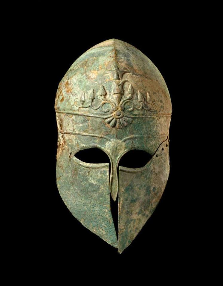 Despite this decline in Greece, the Corinthian helmet did not vanish entirely. It continued to appear in artistic representations into the fourth century BC. In Italy, helmets inspired by the Corinthian style persisted much longer, though they evolved extensively. These "Italo-Corinthian" helmets sat atop the head rather than enclosing it. They had large, non-functional eye holes, suggesting a more symbolic or ceremonial use instead of practical battlefield function. These helmets demonstrate how design adapted differently outside Greece.