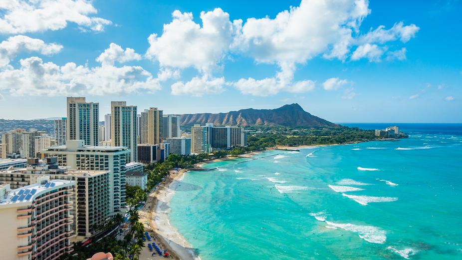 The United States acquires Hawaii through a complex process involving economic ties, political pressure, and military intervention, culminating in annexation in 1898 after the overthrow of the Hawaiian monarchy.