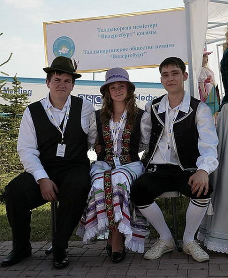 The German people originate from various Germanic tribes, primarily belonging to the West Germanic language family. Ethnic groups such as the Swabians and Frisians descend from these tribes, sharing linguistic and cultural roots. They are collectively called “German” due to the historical development of a shared identity centered around German language, culture, and political structures, especially the Holy Roman Empire.