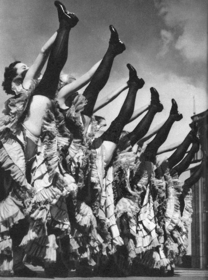 The cancan was a highly provocative and physically demanding dance. Originating in the early 19th century, it was viewed as indecent and often banned. The dance featured high kicks, splits, and energetic movements that required strength and flexibility. By the mid-1800s, the cancan emerged from informal dance halls into more formal establishments, transforming into a professional stage performance.